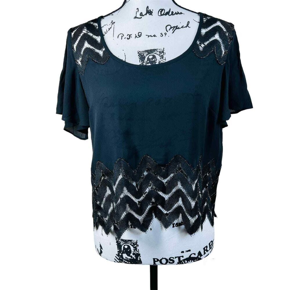 Bebe black blouse short sleeve embroidered lace around neckline boho size S